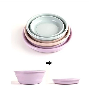 Collapsible multifunctional plastic washbasins in pastel colors showing folding process
