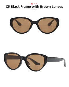 Detail view of cat eye sunglasses with black frames and brown lenses for UV protection