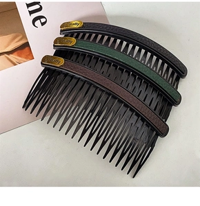 Three-piece hair comb set featuring faux leather texture and metallic Baby lettering detail