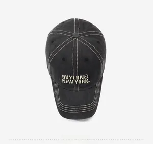 Top view of vintage black baseball cap with BKYLRN embroidery and contrast stitching