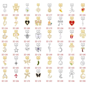 Macro view of modular Italian charms with heart and butterfly motifs in gold and silver