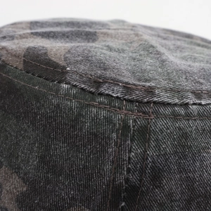 Close-up of the washed camo fabric with detailed stitching on this breathable sun hat