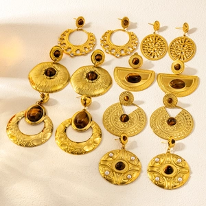 Bohemian gold disk earrings set with natural tiger eye stones and pearl accents