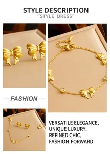 Detailed view of gold bow jewelry set with sparkling round zircons and matte finish