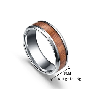 Detail view of 8mm wide wood inlay titanium steel ring with 6g weight specification