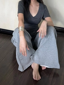 Slim fit dark grey V-neck T-shirt and light grey wide-leg trousers casual set