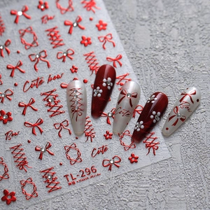 Red bow and lace ribbon nail art stickers TL-296 with metallic finish on white nails