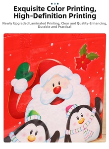 Detail showing the colorful Santa Claus and penguin print on a red non-woven gift bag