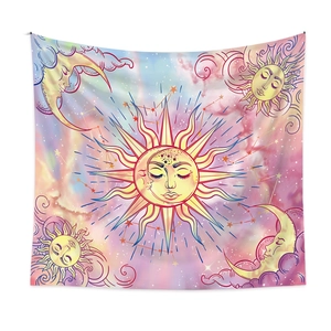 Detail of bohemian sun and moon tapestry with celestial stars and dreamy pastel gradient colors
