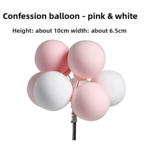 Detail view of pink and white balloon cake topper with dimensions 10cm by 6.5cm