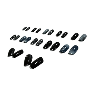 Star and Moon 24pcs press-on nails in star-themed black and deep blue glossy finish