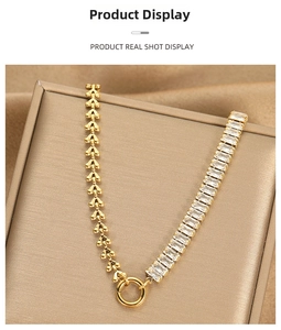 Detail of titanium steel heart link bracelet with inlaid rectangular zircon crystals