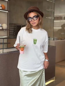 Oversize white cotton T-shirt featuring a vintage American matcha coffee cup graphic print
