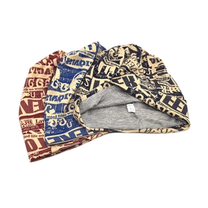 Hip hop beanie hats with newspaper print pattern in red blue and black colors