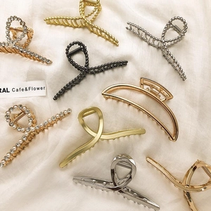 French style metal hair claws with pearls and rhinestones in gold and silver finishes