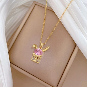 Elegant gold titanium steel necklace with pink rabbit and gift box pendant on silk