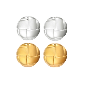 Detailed macro view of gold and silver round stud earrings with grid weave texture