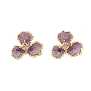 Floral purple enamel stud earrings with gold trim and central square crystal on white background