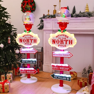 LED Christmas North Pole signpost lamp with Santa snow globe and directional street signs