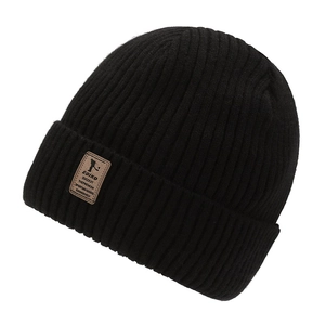 Classic black ribbed knit beanie with leather patch for winter outdoor activities