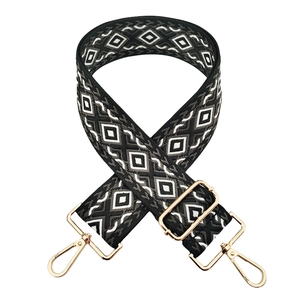Close-up of black and grey geometric diamond weave pattern on an adjustable strap