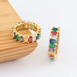 Detailed macro view of rainbow eternity ring with colorful rectangular cut zircons
