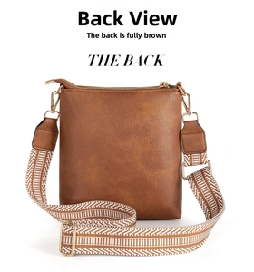 Detail view of the brown PU leather crossbody bag back with jacquard woven strap