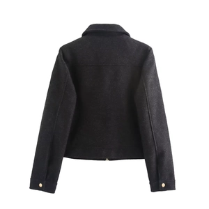 Rear view of black wool jacket featuring high-quality texture and gold cuff buttons