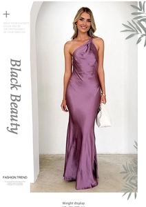 Detailed close-up of a lilac satin off-shoulder dress with glossy texture and slim fit