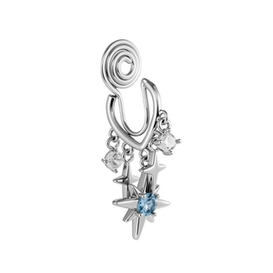 Silver star ear cuff with hanging blue gemstone and sparkling accents on white background