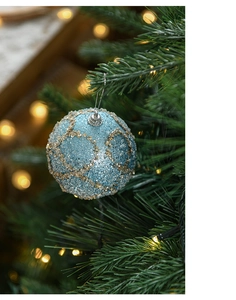 Detail of 8cm light blue Christmas bauble with gold sequins on a festive tree branch