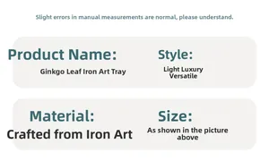Detail van het ijzeren dienblad met ginkgoblad toont luxe metallic textuur en finish