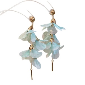 Elegant gold tassel earrings with translucent mint green crystal flower petals on white base
