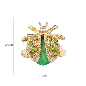 Cute ladybug brooch with green crystals and gold finish measures 2.0cm x 2.2cm