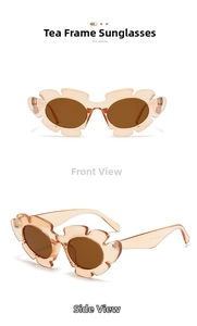 Detail view of flower-shaped translucent brown sunglasses with wavy petal frames