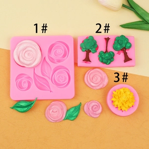 Detailed pink silicone molds for making 3D roses, leaves and trees for cake decoration