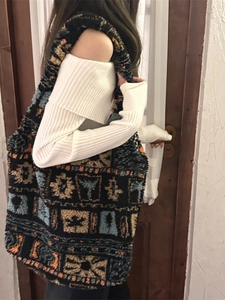 Ethnic plush tote bag with geometric patterns and spacious interior for daily use
