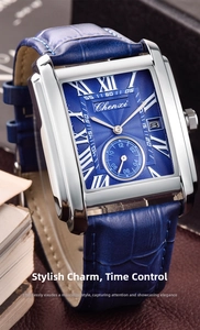 Detail shot of rectangular men's watch with blue leather strap and Roman numeral dial