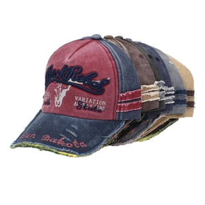 Vintage washed baseball caps with Black Rebel embroidery and distressed details
