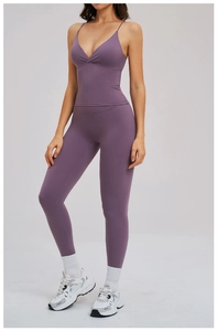 Detail of lavender purple yoga set featuring a V-neck tank top and high waisted leggings