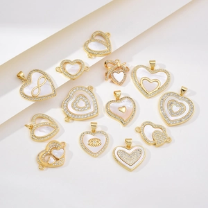 Golden heart pendants with white shell inlay and zircon accents for DIY jewelry making