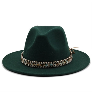 Detail of dark green wool fedora with ethnic woven band and adjustable inner strap
