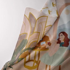 Detailed view of luxury silk scarf with vintage illustration and elegant satin finish