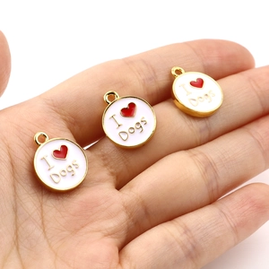 Gold-plated round pet memorial pendant with white enamel, red heart and I Love Dogs text