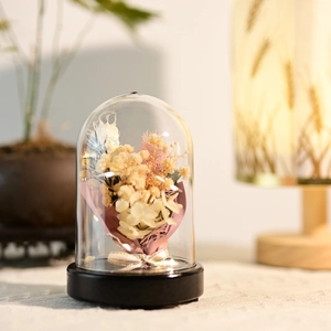 Preserved flower bouquet in glass dome with wood base and soft LED light decor