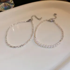 Elegant silver bead and white pearl bracelets set with adjustable lobster clasp