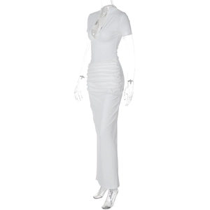 Detailed view of white slim fit maxi dress with deep V-neck and ruched texture design