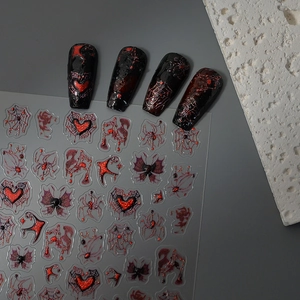 Detailed 3D embossed gothic nail stickers featuring red glitter hearts and spider webs