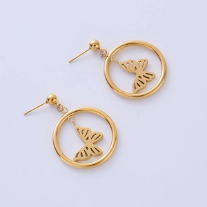 Golden hollow butterfly round hoop earrings in stainless steel for women on white background