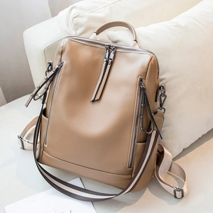 Stylish camel brown leather backpack for women with pebble texture and adjustable straps